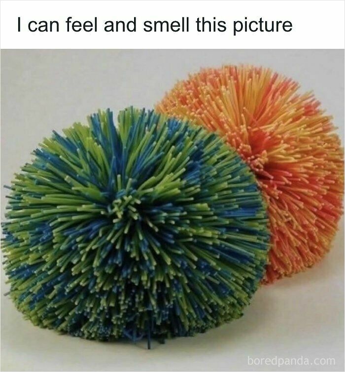 Colorful rubbery Koosh balls on a white surface evoking nostalgic 90s kids memories.