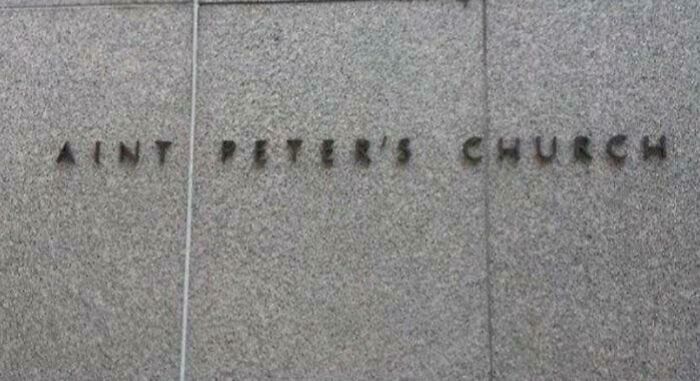 A granite church sign missing a letter to read Aint Peter s Church, showing clever vandalism
