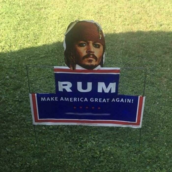 Hilarious act of vandalism replacing a political sign with Captain Jack Sparrow and RUM