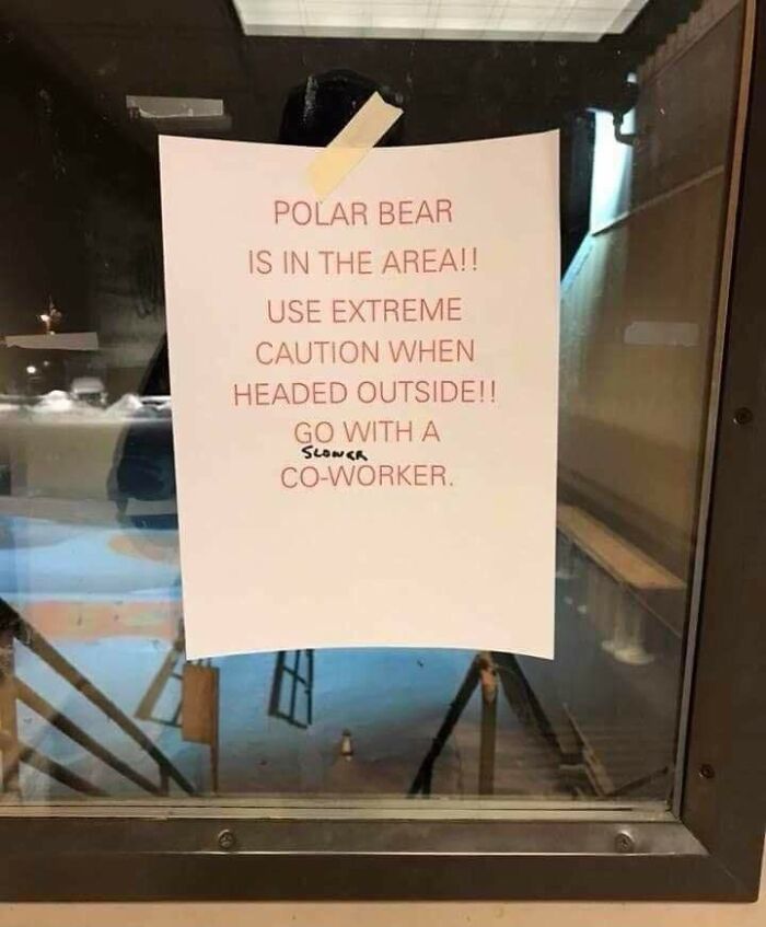 Amusing public art warning sign modified to suggest walking with a slower coworker