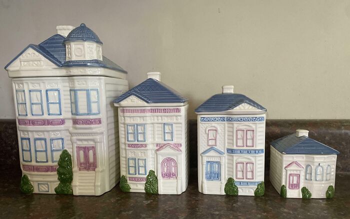 Four ceramic house canisters, great vintage thrift store finds