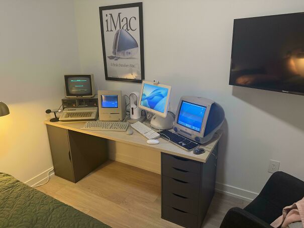 A desk with several classic Apple Macintosh computers, representing vintage tech finds