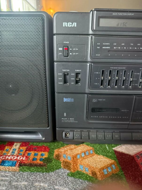 Close up of buttons on an RCA boombox as a nostalgic vintage tech find