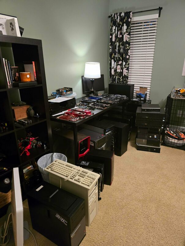 A room filled with retro computer hardware, displaying vintage tech finds