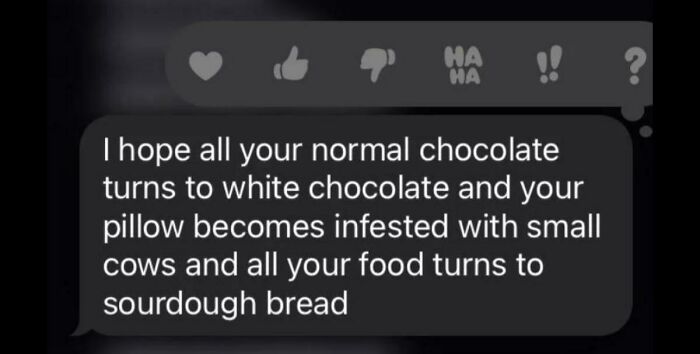 Text message showing oddly accurate insults wishing white chocolate, tiny cows, and sourdough bread on someone.