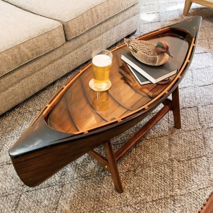 An indoor coffee table shaped like a boat, illustrating clever wooden creations