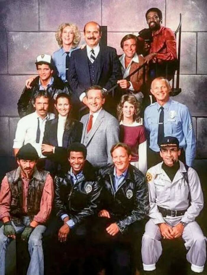 Classic 1970s TV show cast group photo with vintage style clothing