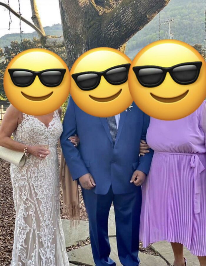 A guest wearing a white gown next to the groom and bride in purple at questionable wedding moments