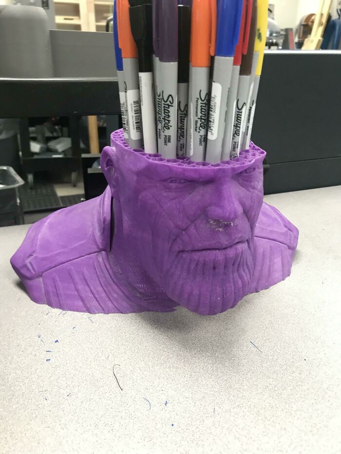 A purple Thanos bust pen holder printed using a 3D printer
