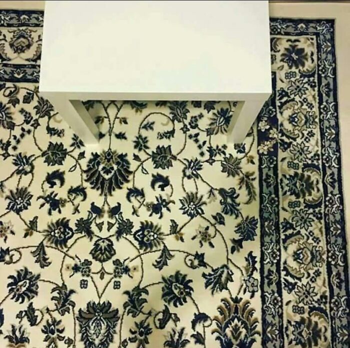 A classic case of accidental camouflage as a phone blends perfectly with a floral patterned rug