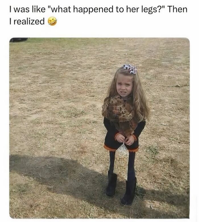 An optical illusion of a girl holding popcorn, appearing to have very thin legs, as seen in edgy memes.