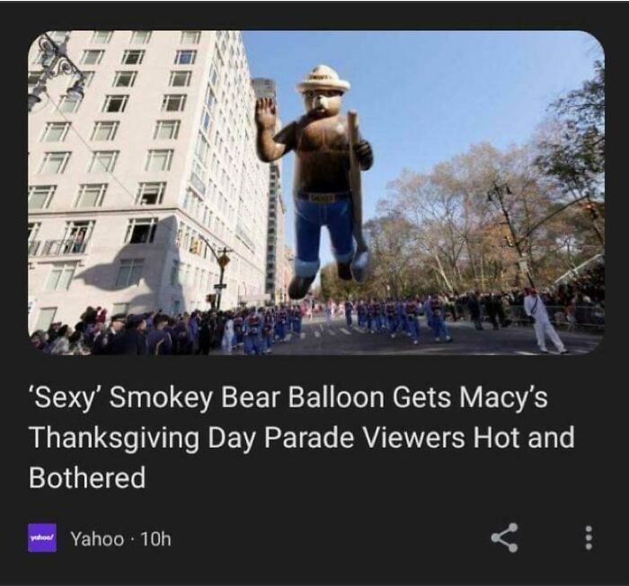 Smokey Bear balloon floating in a parade, showcasing unhinged news headlines that bring humor.