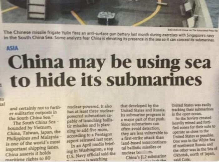 Newspaper clipping with the absurd statement that China may hide submarines in the sea, a funny news headline.