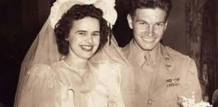 Black and white photo of a smiling couple on their wedding day from weird things about history