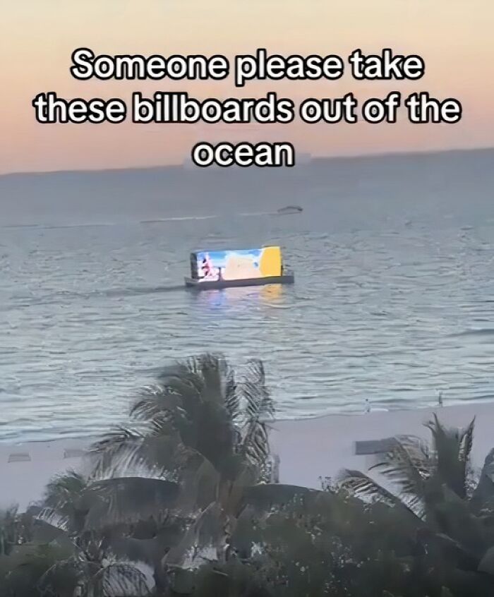 A digital billboard boat on the water exemplifying modern life in America