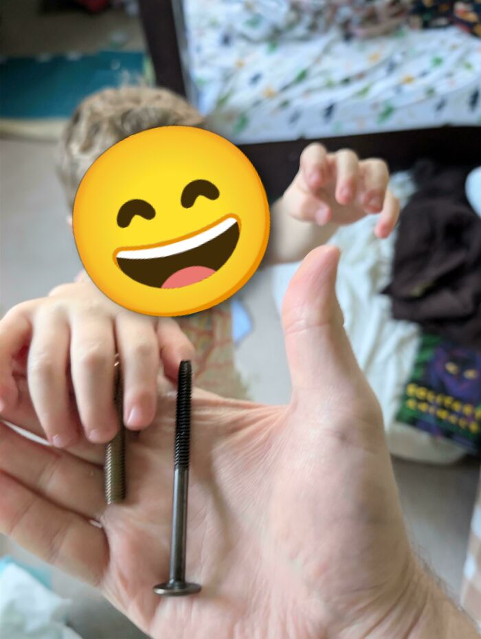 A parent holding screws next to a child, illustrating the helpful nature of wholesome dads.