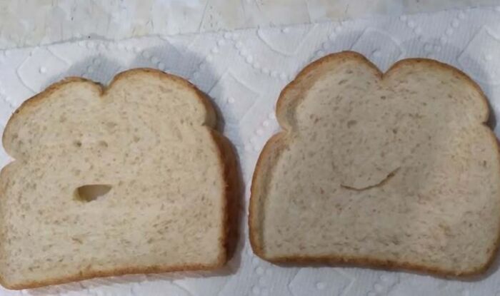 Two slices of bread with patterns that look like staring faces