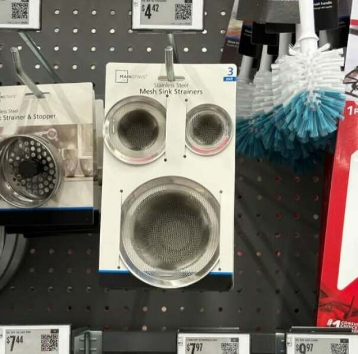 Mesh sink strainers arranged to look like a face staring