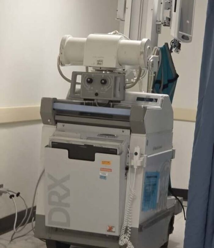Medical machine with components resembling a face staring