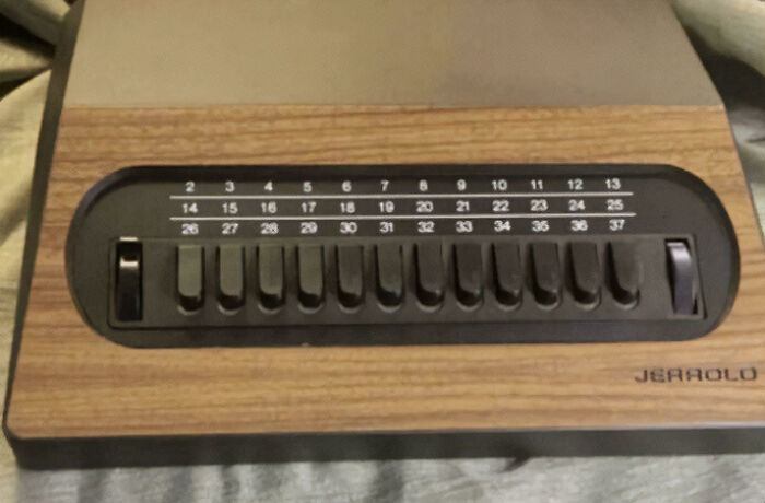 Vintage Jerrold switch TV channel dial with wood finish nostalgia