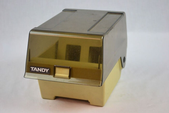 A vintage Tandy floppy disk storage box representing nostalgic photos of past tech.