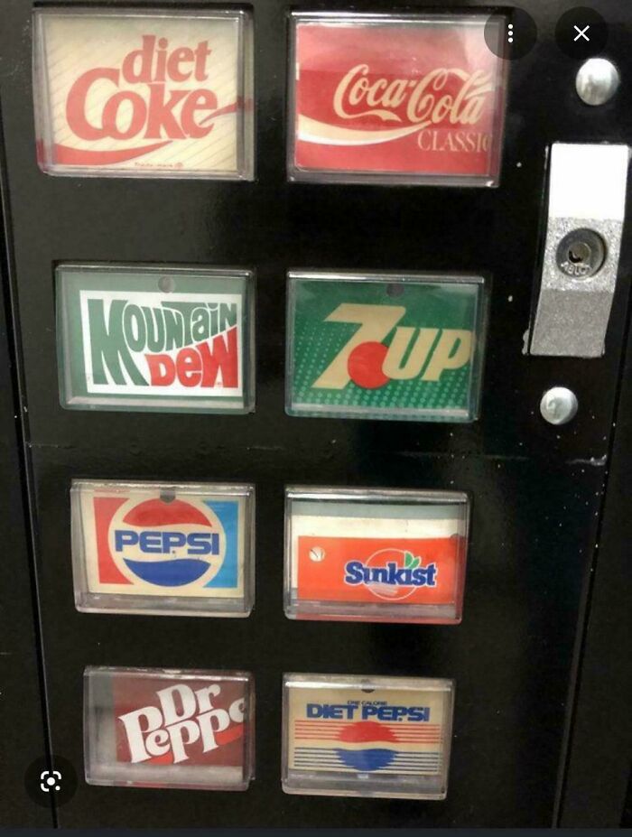 Vintage soda vending machine with classic beverage logos like Diet Coke and Mountain Dew nostalgic photos