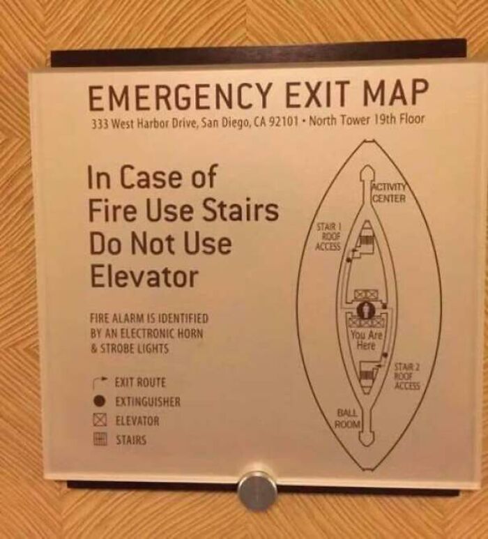 Confusing emergency exit map with unclear fire escape directions in a building