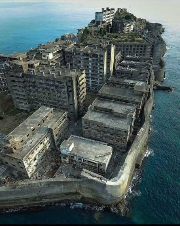 Abandoned concrete buildings on island showing extreme construction fail
