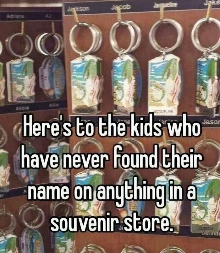 A display rack of personalized keychains evoking nostalgic souvenir store memories
