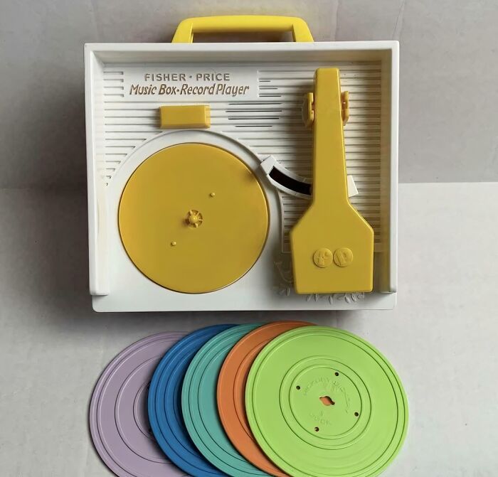 Fisher Price vintage music box record player with colored discs