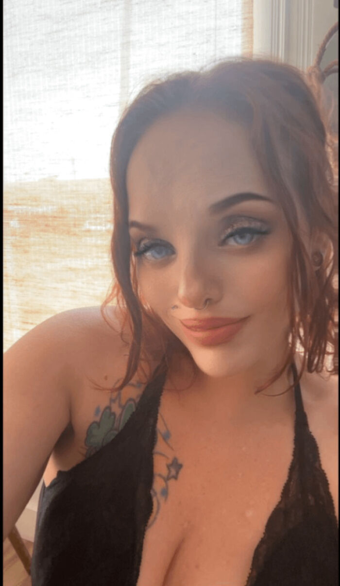 Ridiculous edited photos of a woman with a smooth face and exaggerated makeup in selfie