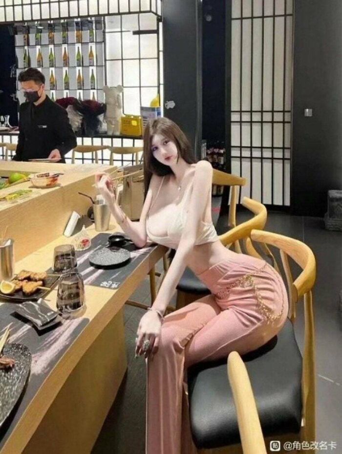 Edited photo of woman with impossibly slim arms and body distortion