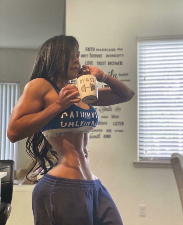 Photo manipulation showing unrealistically slim waist and muscular arms