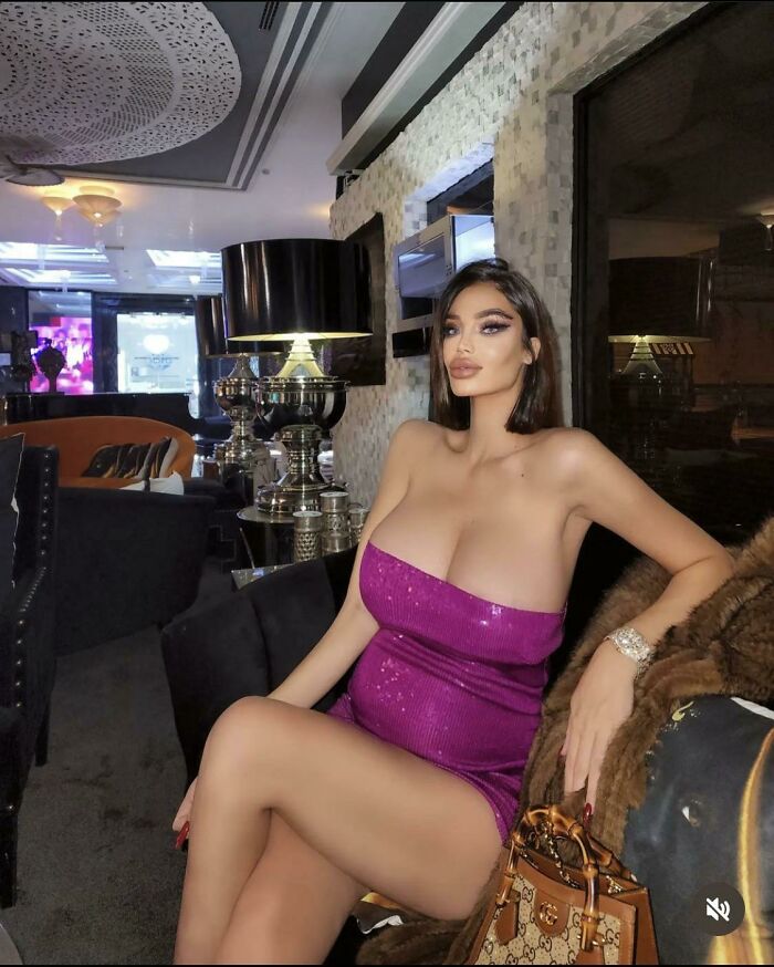 Ridiculously edited woman in glamorous dress with exaggeratedly enhanced body proportions