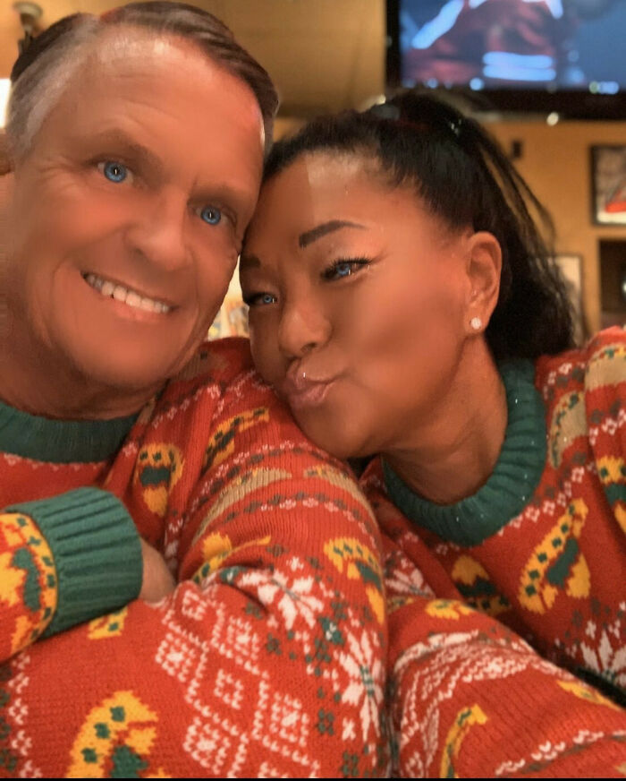 Ridiculous edited selfie of couple in colorful matching sweaters