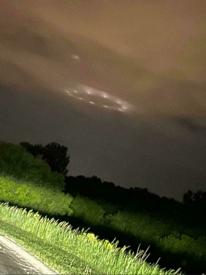 A mysterious ring of lights glowing in the night sky in one of these creepy photos.