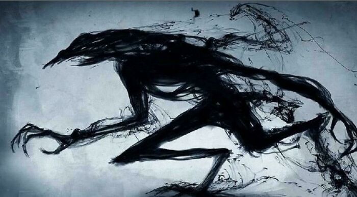 A dark silhouette illustration of a terrifying monster, perfect for creepy photos and stories.
