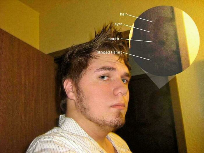 A man taking a selfie with a zoomed-in dark figure behind him, highlighting creepy photos with spooky details.