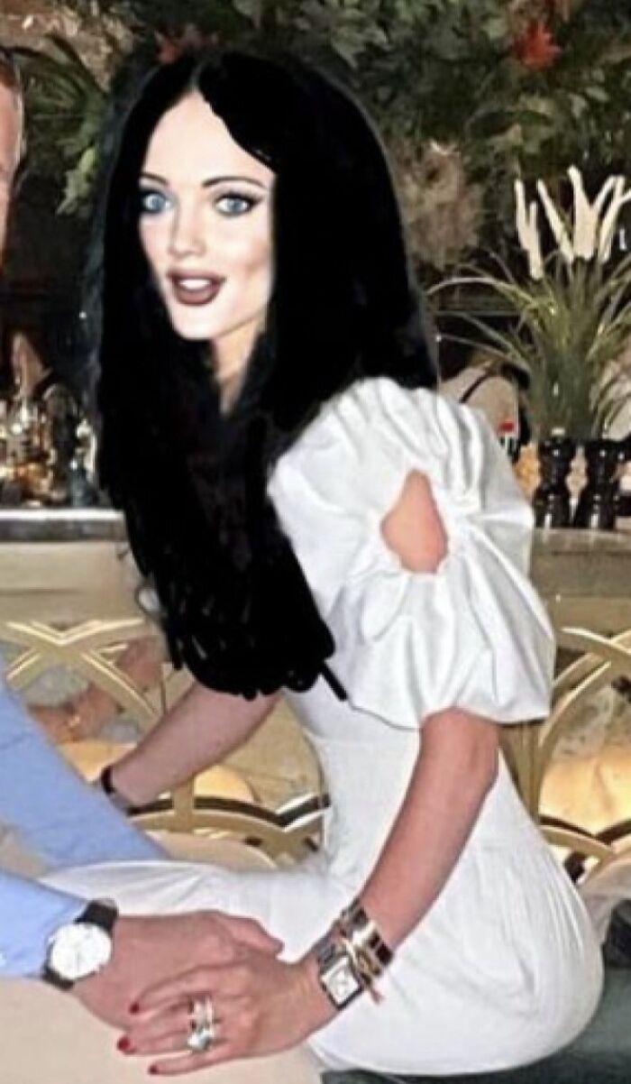 Ridiculously edited photo of a woman with exaggerated facial features in a white dress