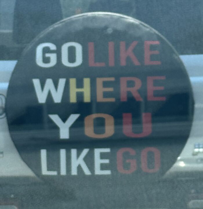 Hilarious badly designed signs on a car spare tire cover with confusingly placed text