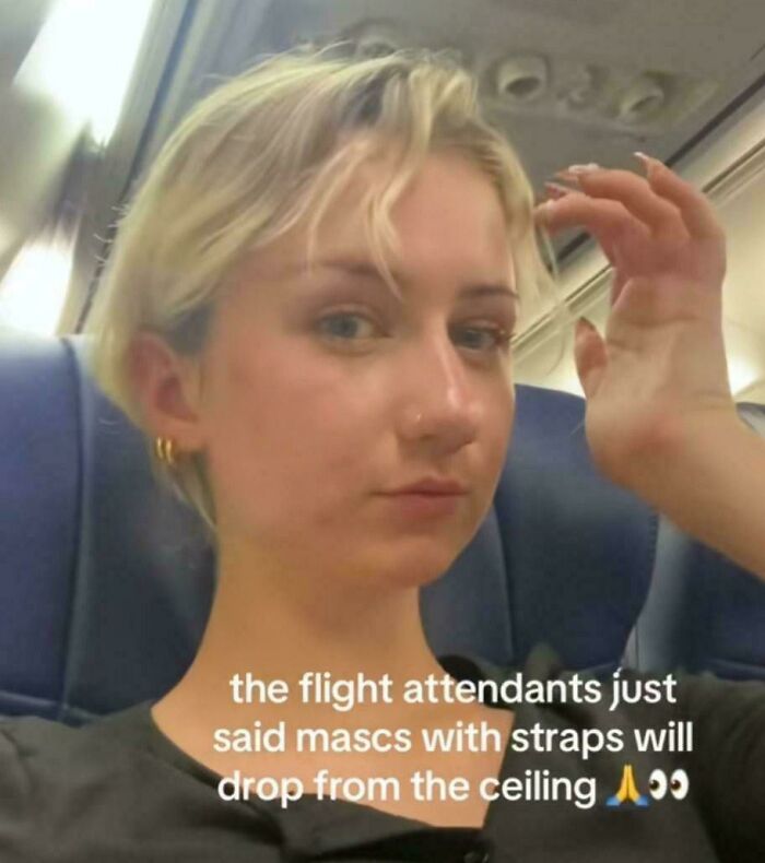 A selfie on an airplane showing how someone missed the point of a joke about oxygen masks.