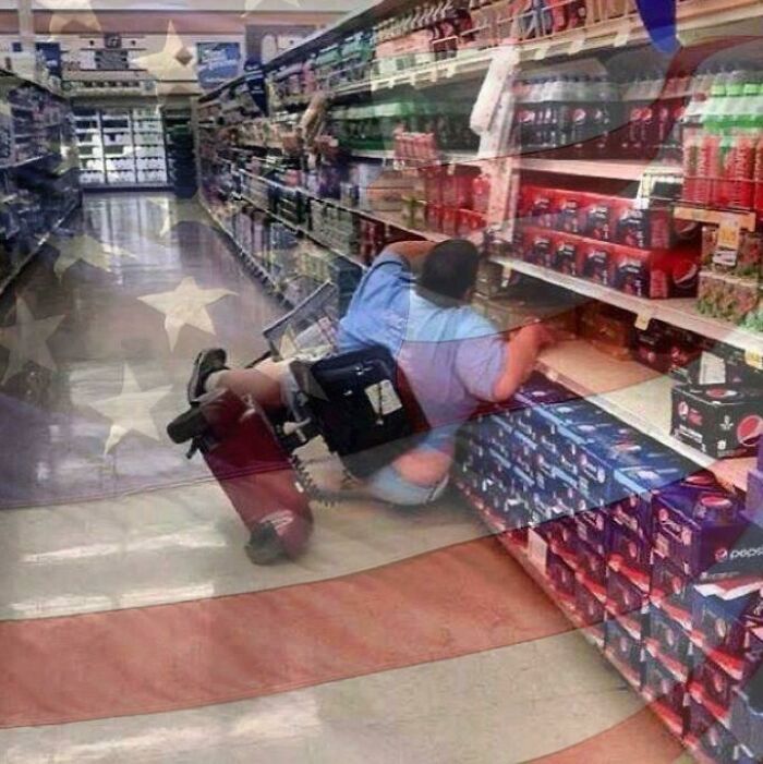 Person lying on the floor in Walmart aisle near shelves of soda