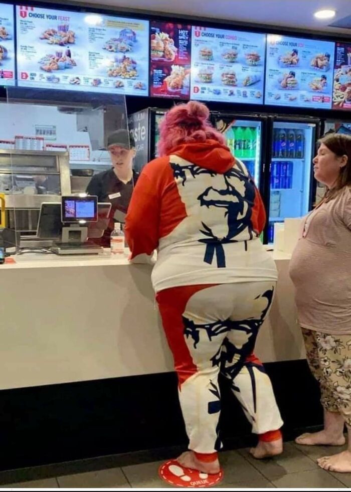 Customer at Walmart dressed in KFC themed outfit ordering food