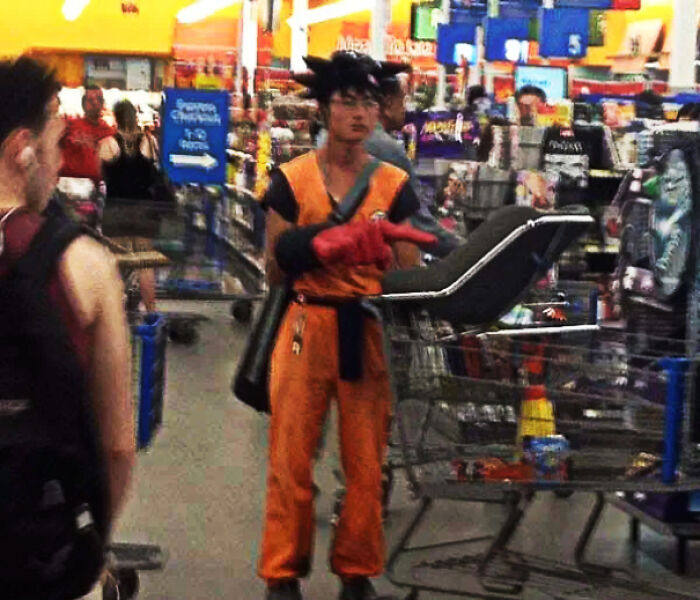 Shopper dressed as anime character Goku shopping inside Walmart