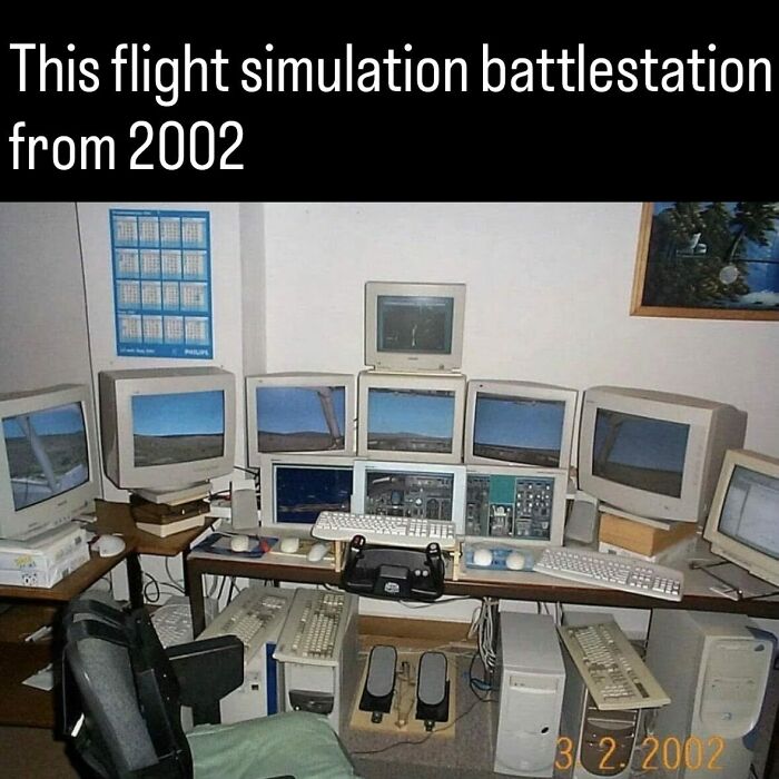 A retro 2002 flight simulation computer battlestation setup with multiple CRT monitors, an intriguing photo from history.
