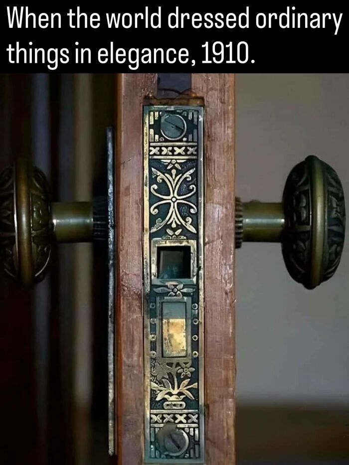 Close-up of an ornate 1910 brass door lock mechanism, highlighting detailed facts about history.