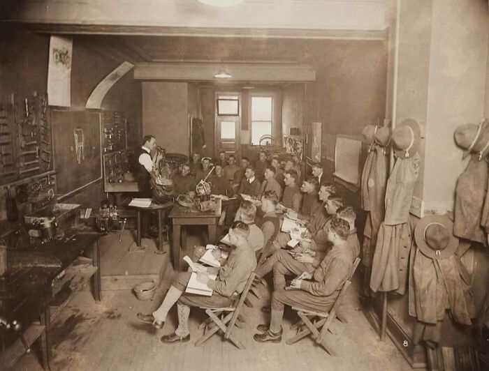 Rare historical photo of classroom with soldier students and instructor