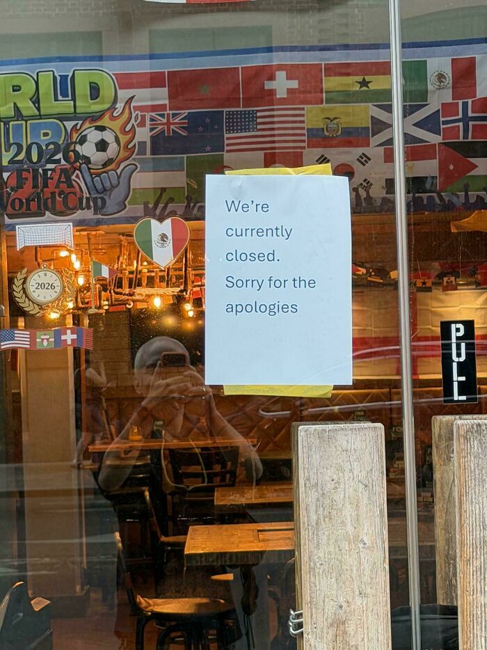 Sign on door apologizing for closure in cursed images collection