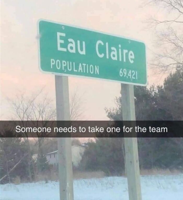 Road sign for Eau Claire with funny caption about taking one for the team