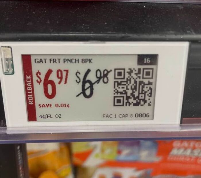 Cursed image of a store price tag showing rollback price with original price barely lower